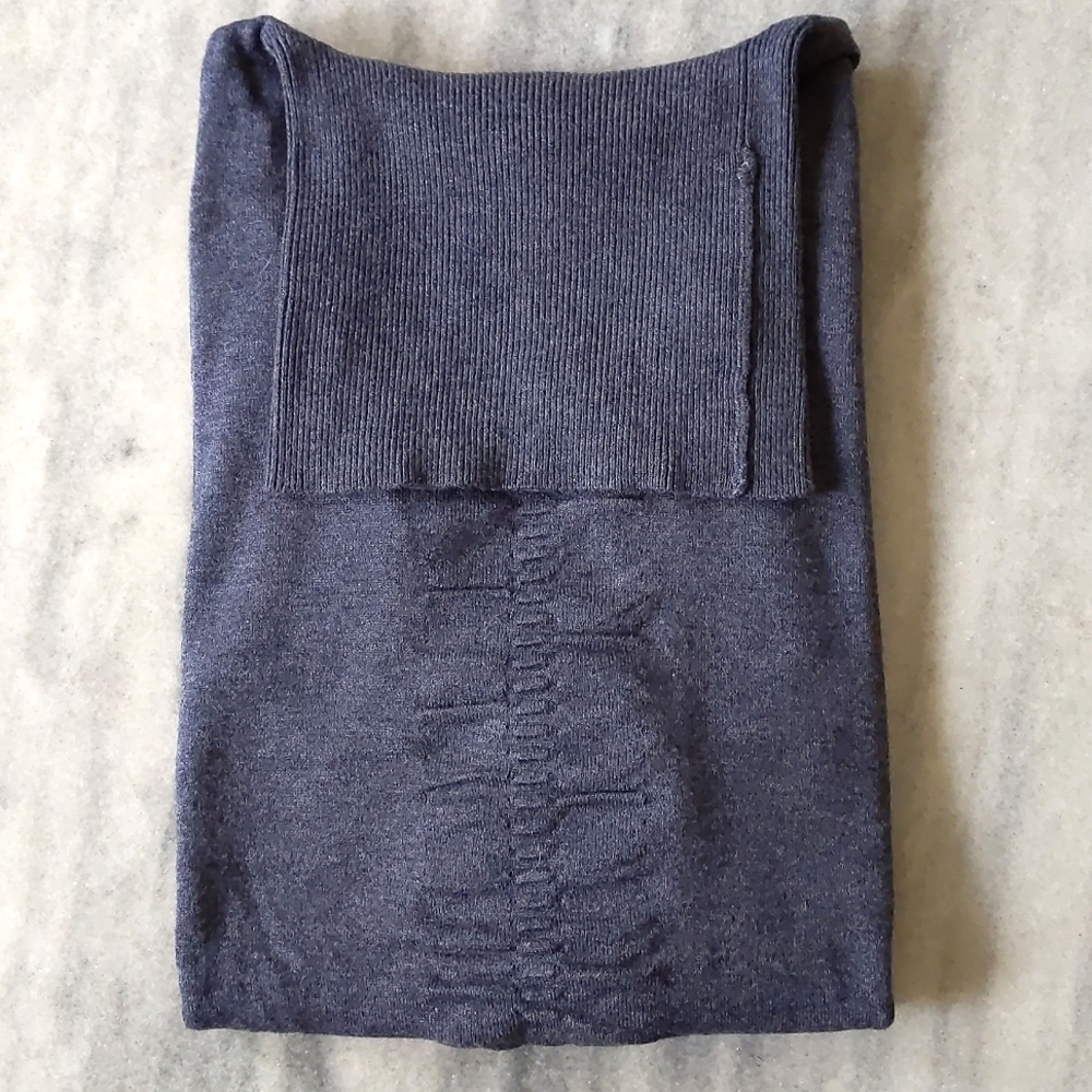 NWT. Express Woman's Rayon blended turtleneck sweater with front design.
